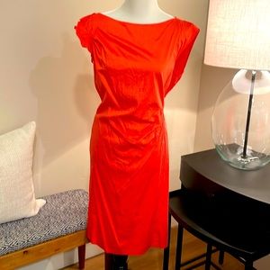 Hugo Boss Dress! It’s a coral orange color- definitely not peach.